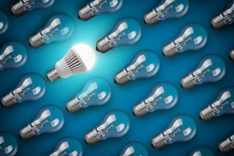 Idea concept with light bulbs on blue background Stock Photos