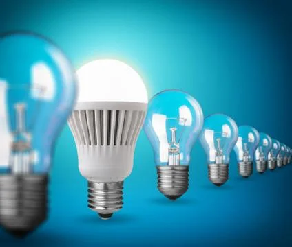 Idea concept with light bulbs on blue Stock Photos