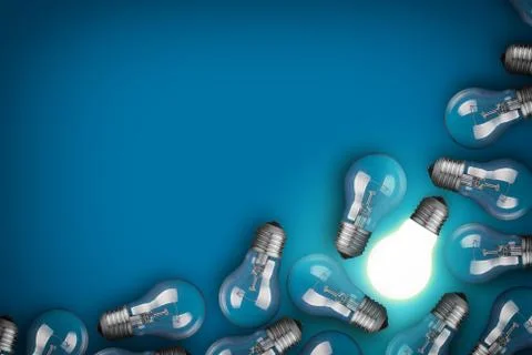Idea concept with light bulbs on blue background Stockfoto's