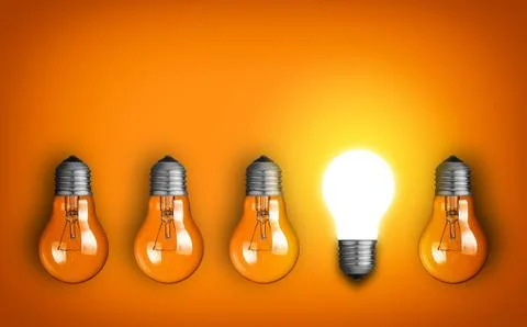 Idea concept with row of light bulbs and glowing bulb Stock Photos