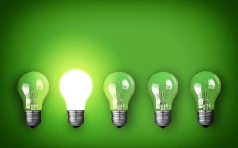 Idea concept with row of light bulbs and glowing bulb Stock Photos