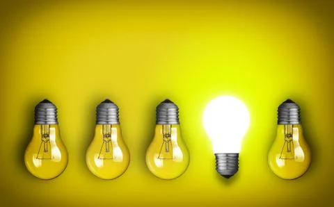 Idea concept with row of light bulbs and glowing bulb Stock Photos