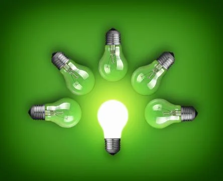 Idea concept with row of light bulbs and glowing bulb 库存照片