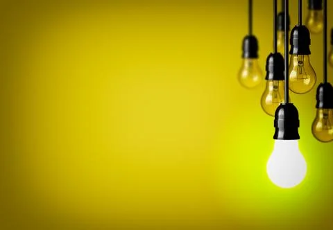 Idea concept on yellow background. Stock Photos