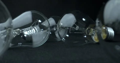 Idea, creativity concept. Light bulbs glowing on dark background. Stock Footage 143171242