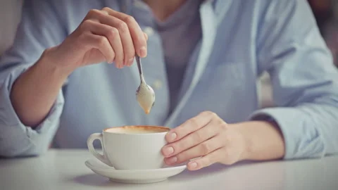 Idea of daily beverage preparation warm natural light illuminates a ceramic Stock Footage 342240621