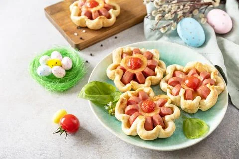 Idea for Easter breakfast or lunch. Mini pizza. Pizza in puff pastry with c.. Stock Photos