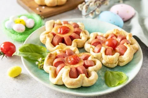 Idea for Easter breakfast or lunch. Mini pizza. Pizza in puff pastry with c.. Stock Photos