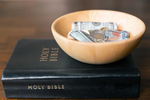Idea of giving tithe as an offering to charity filled him with hope and pea.. Stock Photos