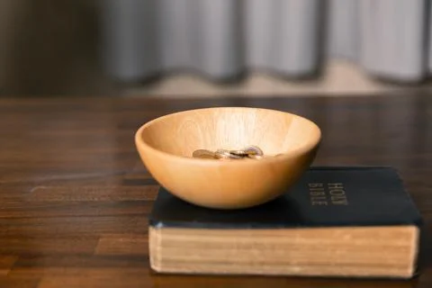 Idea of giving tithe as an offering to charity filled him with hope and pea.. Stock Photos