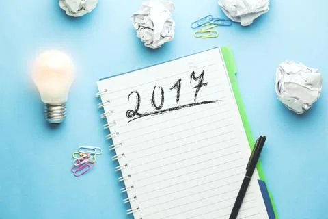 Idea with  notepad and crumpled papers Stock Photos