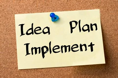Idea - Plan - Implement - adhesive label pinned on bulletin board Stock Photos