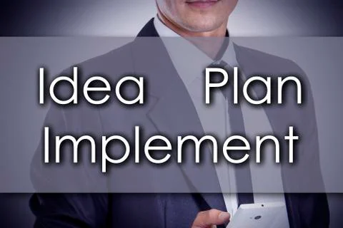 Idea - Plan - Implement - Young businessman with text - business concept Stock Photos