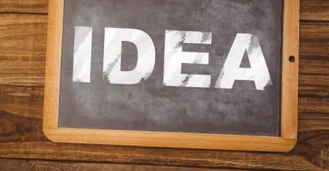 Idea text on blackboard Stock Photos