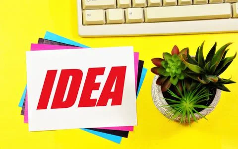 Idea. A text label in a working notebook. Stock Photos