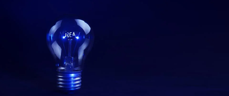 Idea text on light bulb Stock Photos