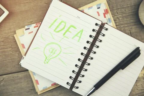Idea writing on notebook Stock Photos