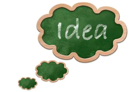 Idea written on a thought bubble shaped blackboard Stock Illustration