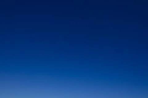 Ideal clear sky as gradient and background. Azure sky without clouds. Stockfoto's