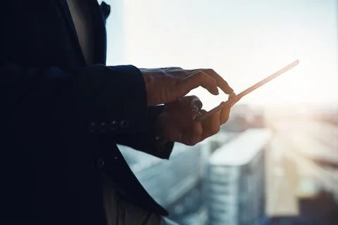 The ideal device to simplify work tasks. Closeup shot of an unrecognizable Stock Photos
