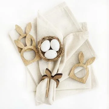 Ideas for decorating linen napkins for the Easter table. Stock Photos