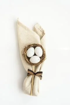 Ideas for decorating linen napkins for the Easter table. Stock Photos