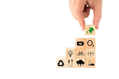 Ideas to save the environment for World Environment Day. hand picking up wood Stock Photos