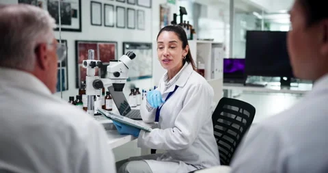 Ideas, scientist and group with tablet, lab and discussion for medical research Stock Footage 305803066