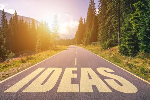Ideas word written on road in the mountains Stock Photos