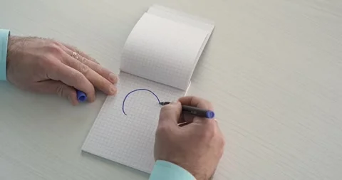 Ideea  - this word is written on the sheet by a man's hand Stock Footage 267083572