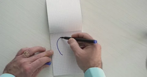Ideea  - this word is written on the sheet by a man's hand Stock Footage 267084395
