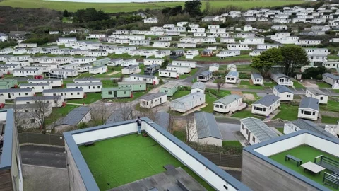 Identical static caravans creating urban holiday sprawl in Salcombe Video stock 302157849