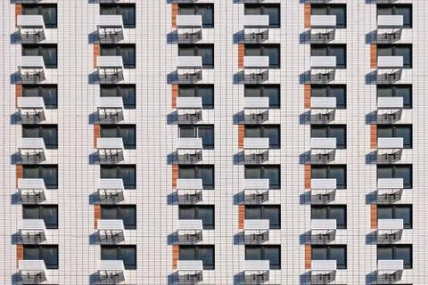 Identical windows building sloping upwards Stock Photos