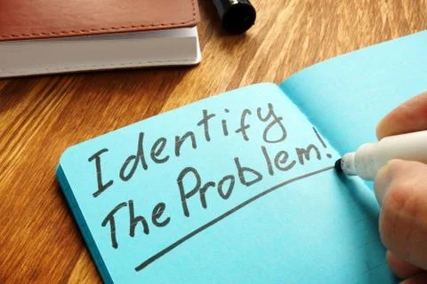 Identify the problem sign on the blue page. Stock Photos