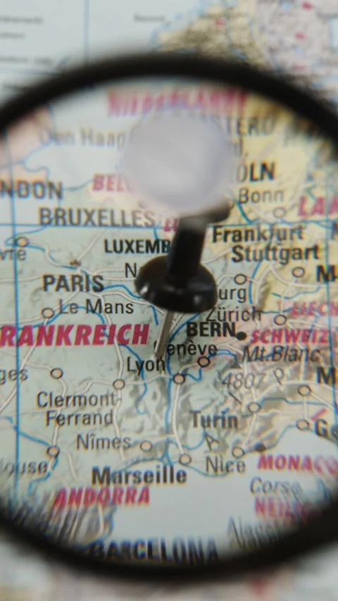 Identifying a location on a paper map Stock Footage 343288377