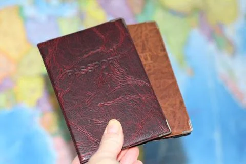 Identity document on the background of a geographical map. Stock Photos