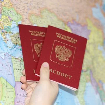 Identity document on the background of a geographical map. Stock Photos