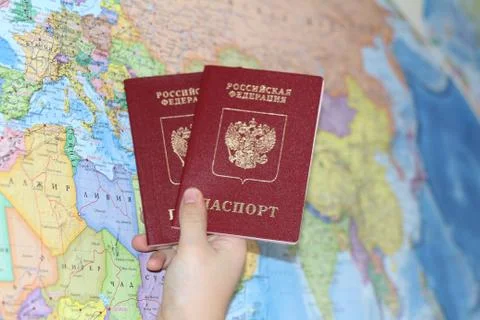 Identity document on the background of a geographical map. Stock Photos