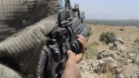 IDF soldier shoots an explosive grenade Stock Footage 168477217