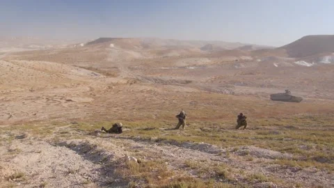 IDF soldiers getting up and running 스톡 동영상 168536638