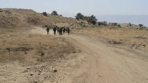 IDF soldiers running Stock Footage 168535706