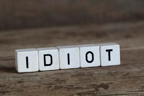 Idiot, written in cubes Foto stock