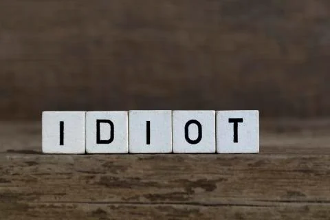 Idiot, written in cubes Stock Photos