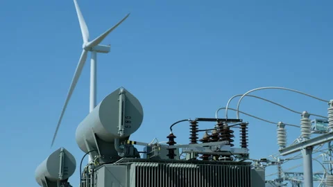 Idle generator in windless weather and power transformer Stock Footage 158164577