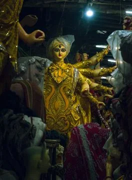 Idol of Devi Durga wrapped in plastic Stock Photos