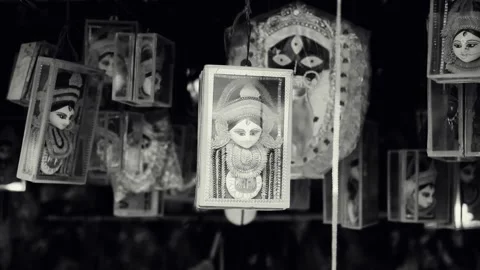 Idol of Hindu Goddess Durga made with thermocol and hanging in glass backgrou Stock-Footage 136410237