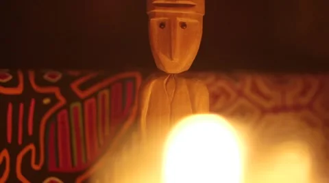 Idol Surrounded by Candles Stock Footage 47209346