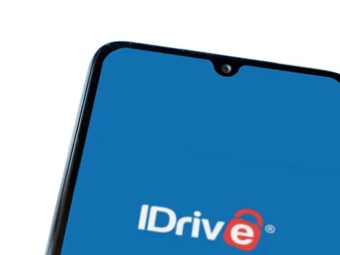 IDrive Online Backup app launch screen on smartphone on white background Stock Photos