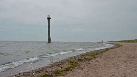 IDYLLIC. Abandoned lighthouse inside the water, sea. Stock Footage 282641886