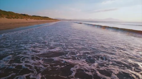Idyllic aerial footage of tidal waves on sunny day Stock Footage 59081758